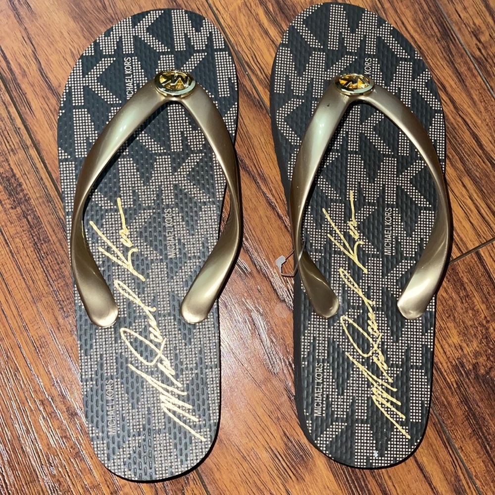 NEVER WORN. Michael Kors flip flops